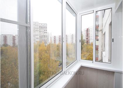 Холодное остекление балкона профилем Provedal с отделкой стен и потолка ламинированными панелями в Долгопрудном