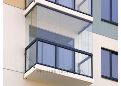 Безрамное остекление балкона с внешней отделкой в Долгопрудном