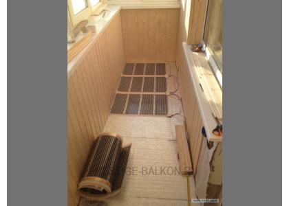 Теплое остекление лоджии пластиковыми окнами с теплым пленочным ИК полом в Долгопрудном